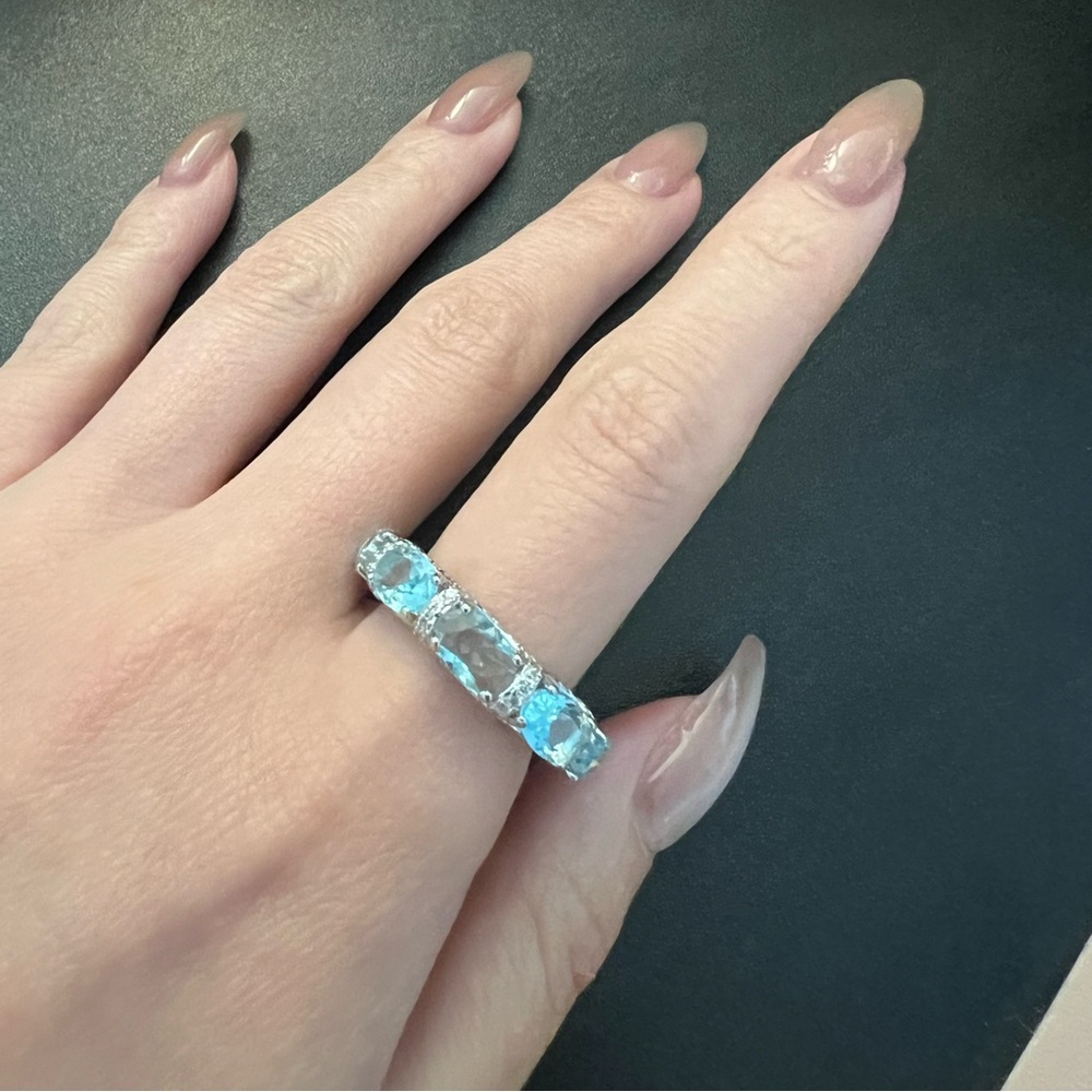 Aquamarine colored gem ring